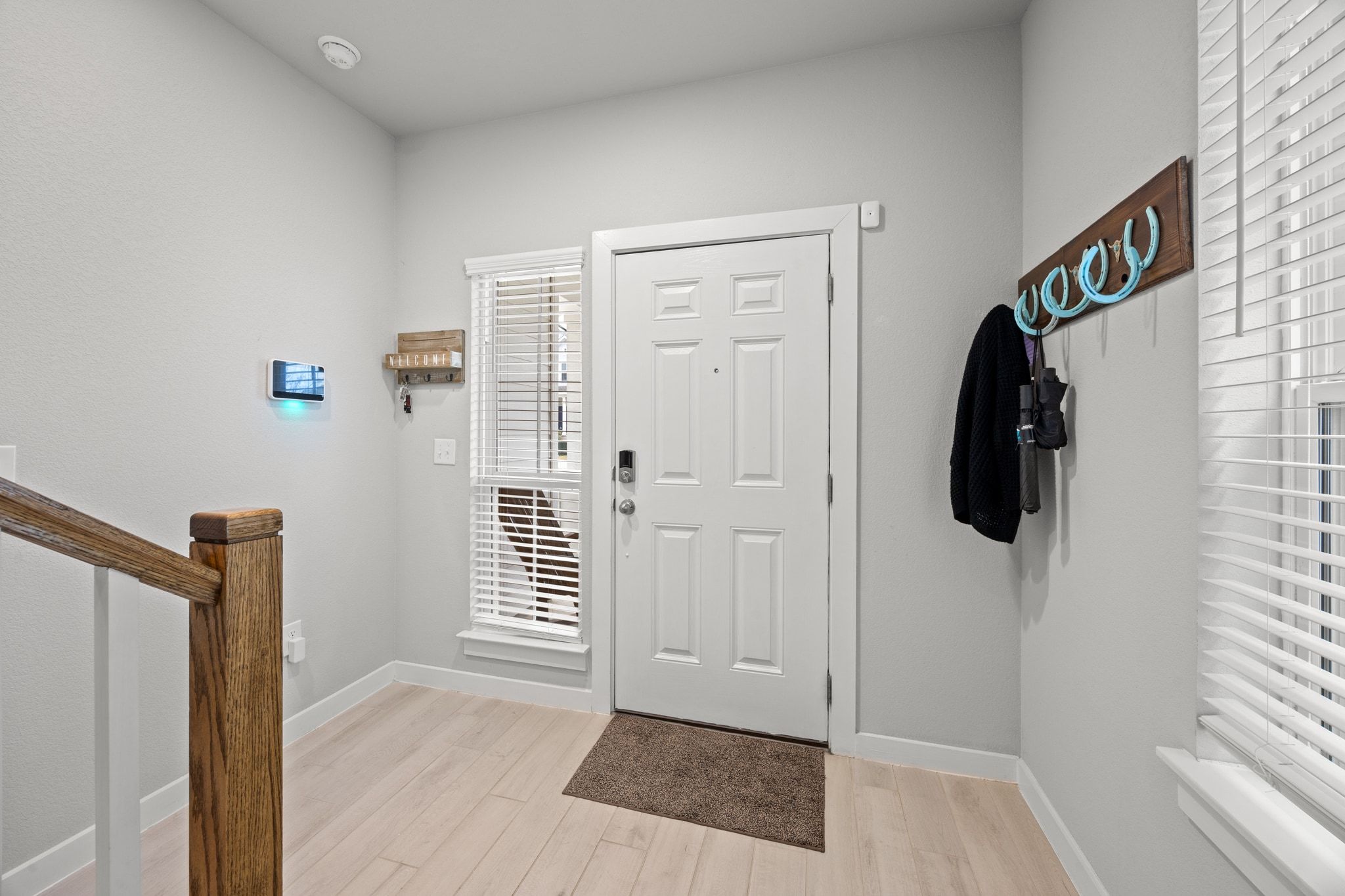 161 Appleberry Lane Elgin, TX 78621 - Photo 5 of 40 a view of hallway with walk in closet and window