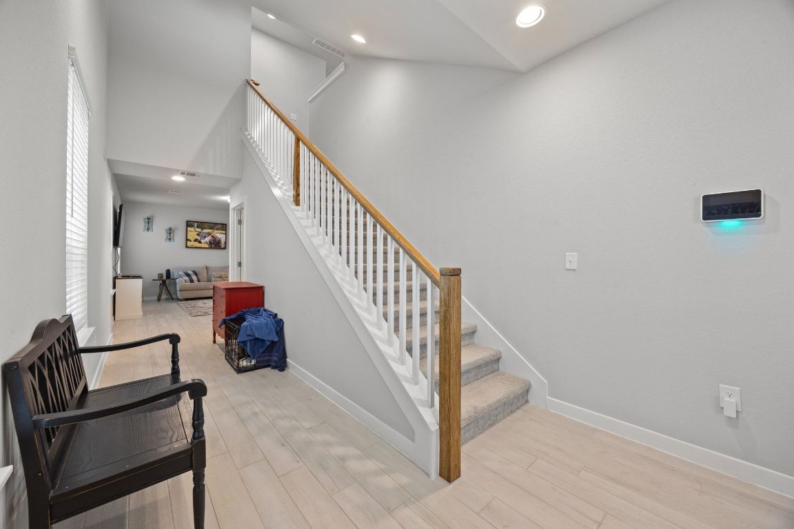 161 Appleberry Lane Elgin, TX 78621 - Photo 5 of 40 Custom staircase railing - the builder no longer offers this railing option.