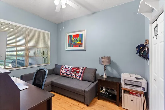 a living room with furniture and a window