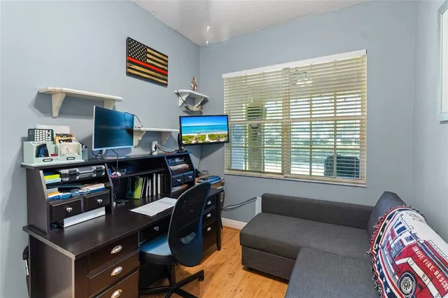 a living room with furniture and a window