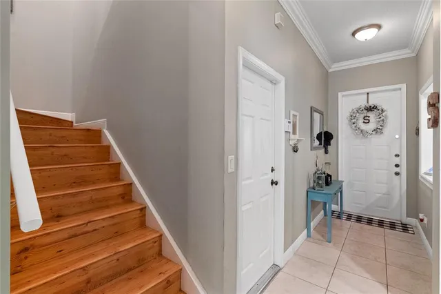 a view of an entryway with staircase