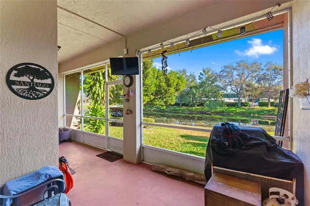 image of a room with furniture and a potted plant