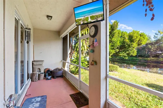 a view of lake with green space