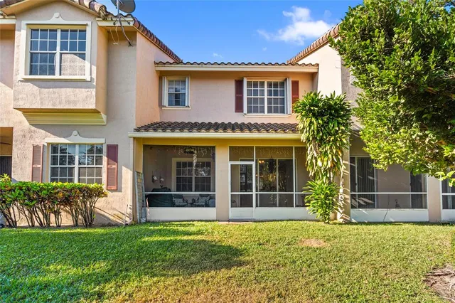 a view of a lake with a yard