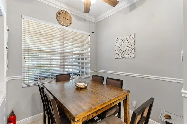 a view of a dining table and chairs