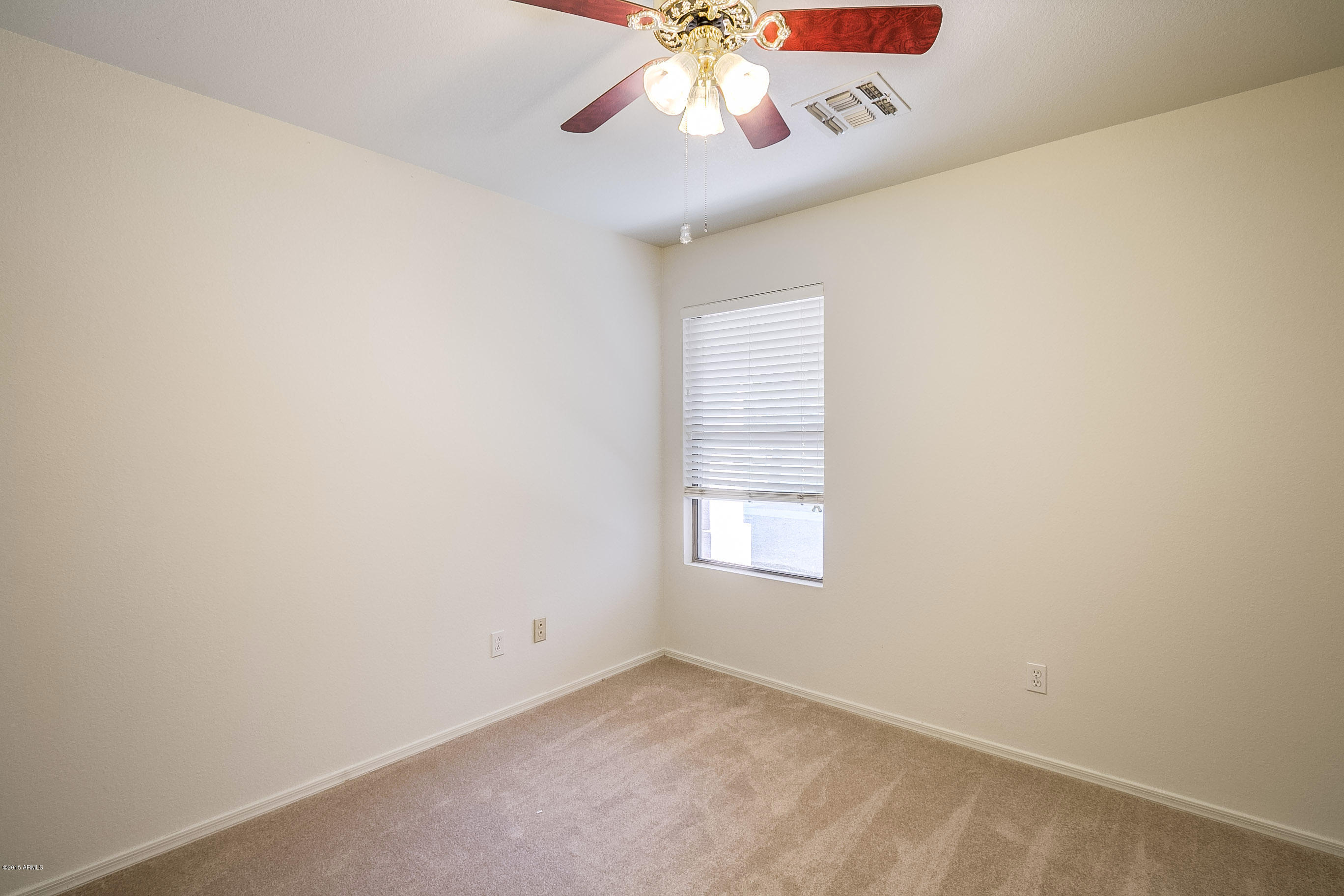 445 West Aviary Way Gilbert, AZ 85233 - Photo 11 of 27 an empty room with a window