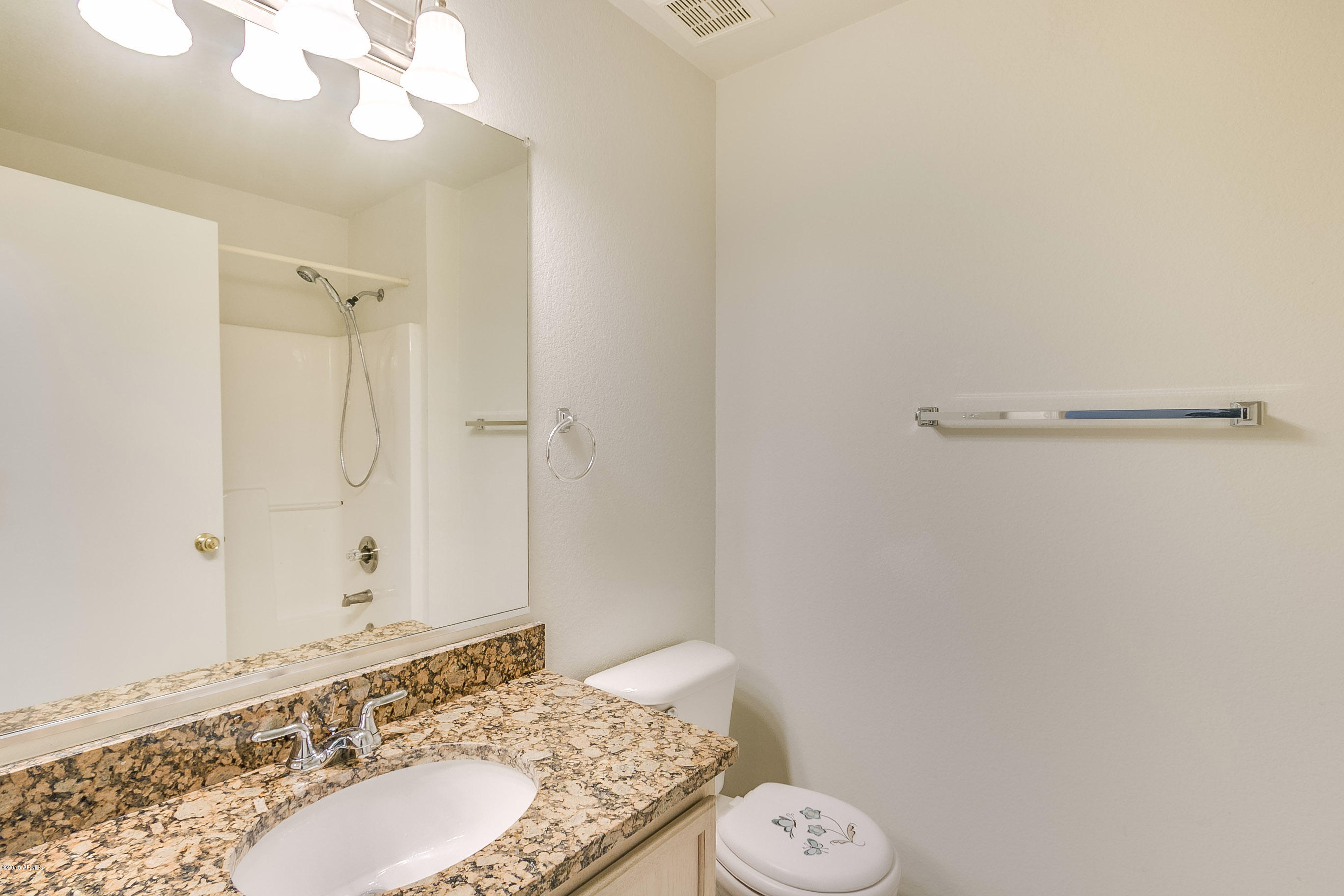 445 West Aviary Way Gilbert, AZ 85233 - Photo 15 of 27 a bathroom with a granite countertop sink and a mirror
