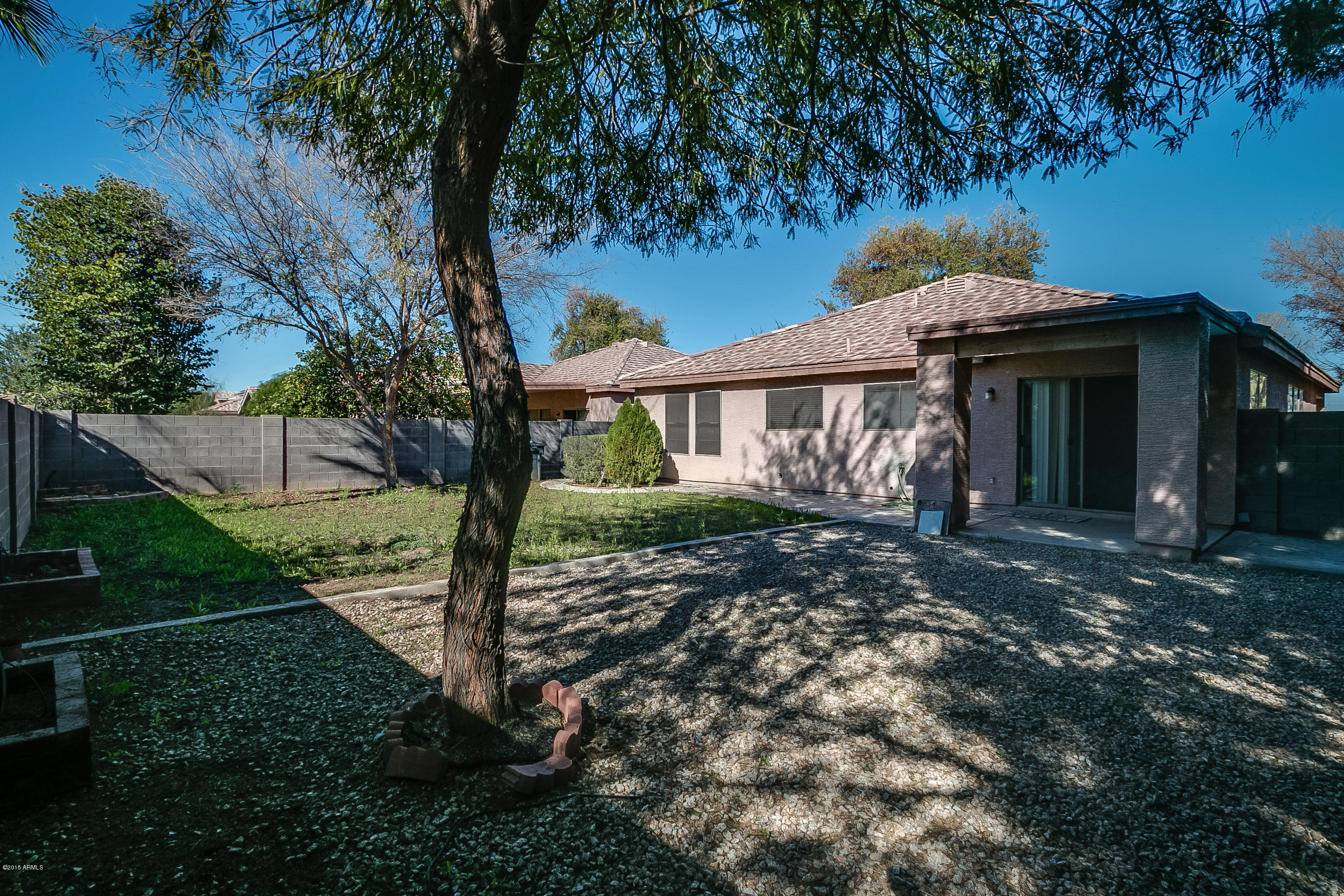 445 West Aviary Way Gilbert, AZ 85233 - Photo 25 of 27 a front view of a house with garden