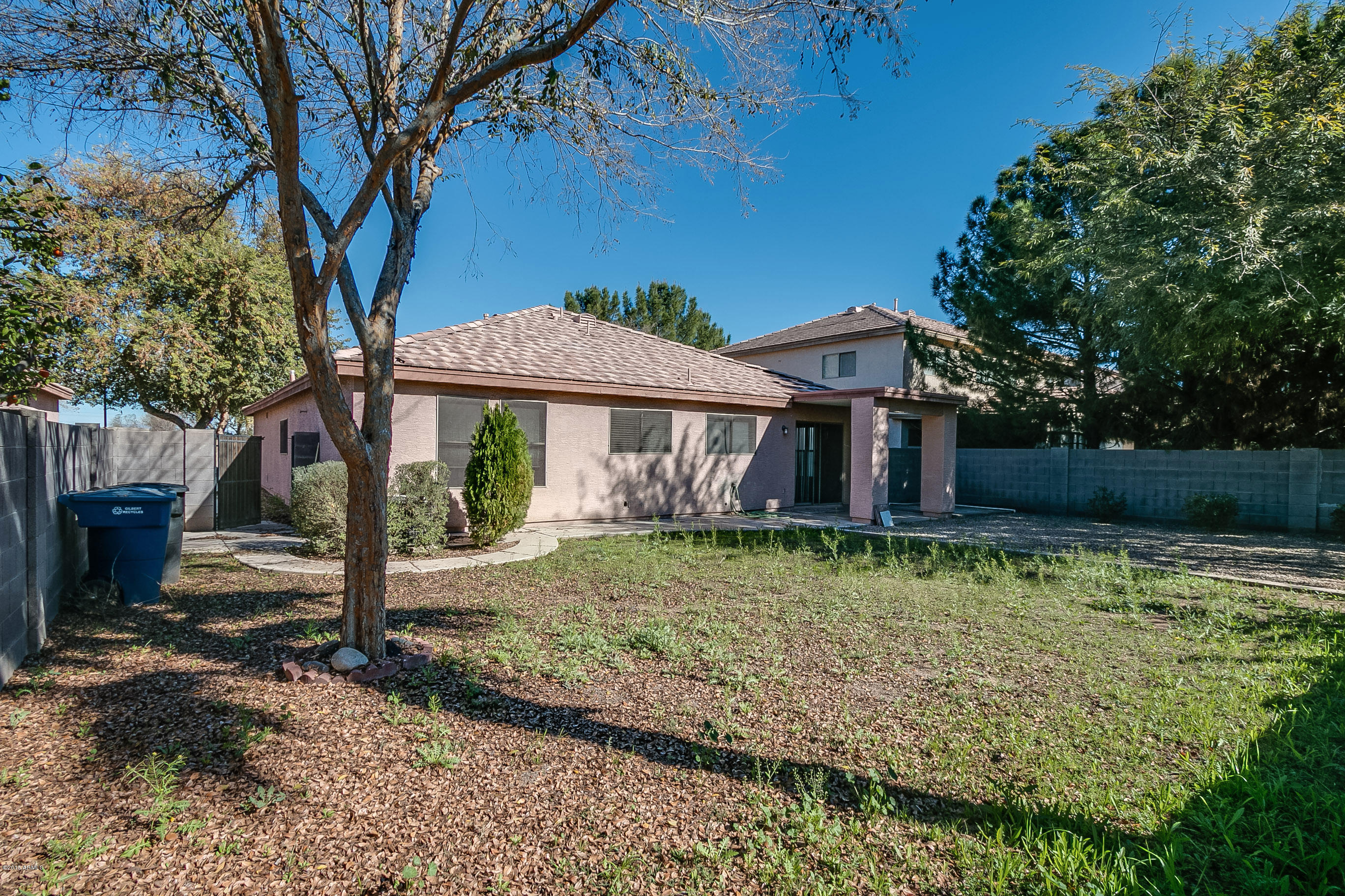 445 West Aviary Way Gilbert, AZ 85233 - Photo 26 of 27 a front view of a house with garden