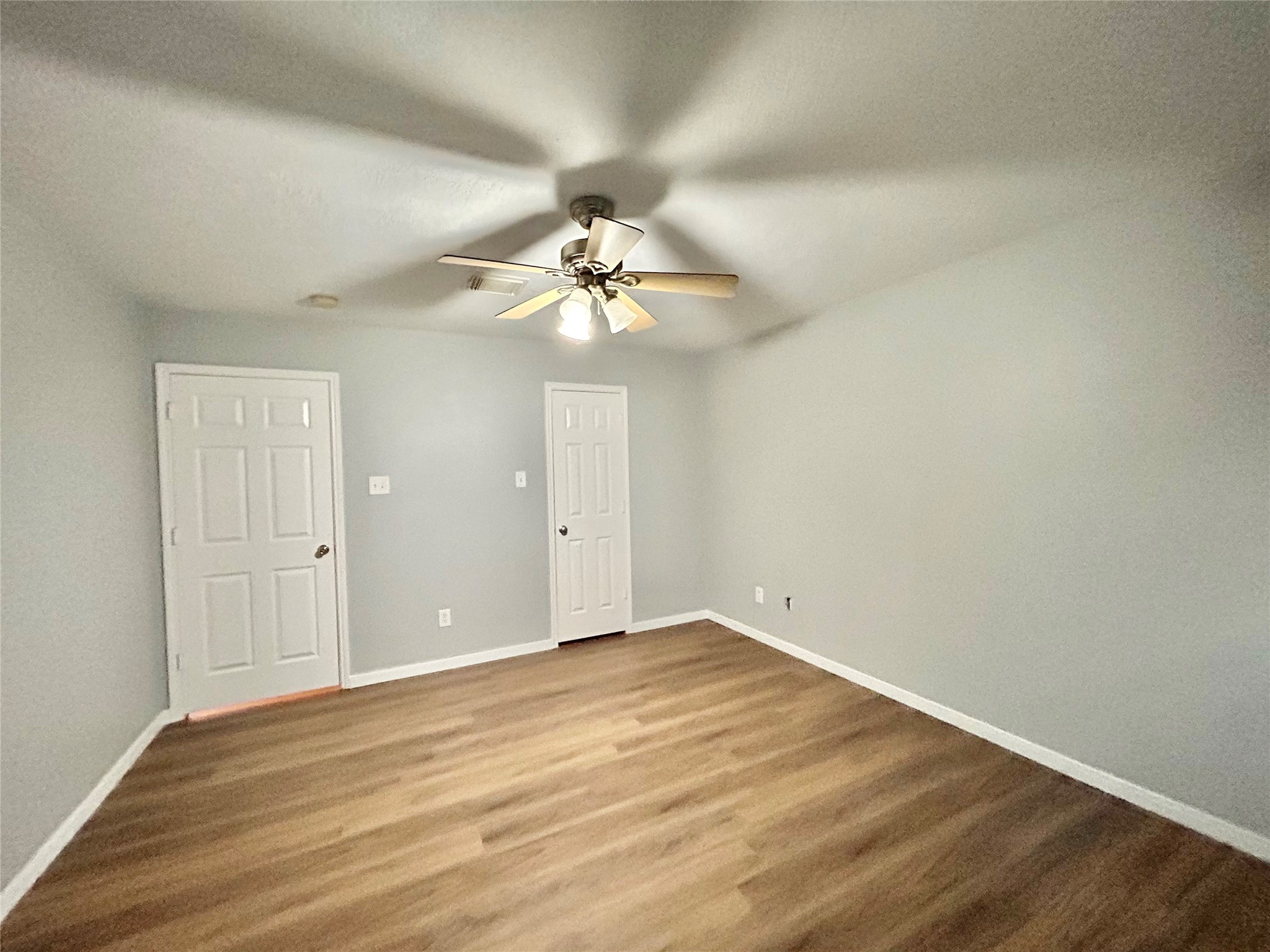 22918 Breton Point Drive Spring, TX 77373 - Photo 38 of 49 wooden floor in an empty room