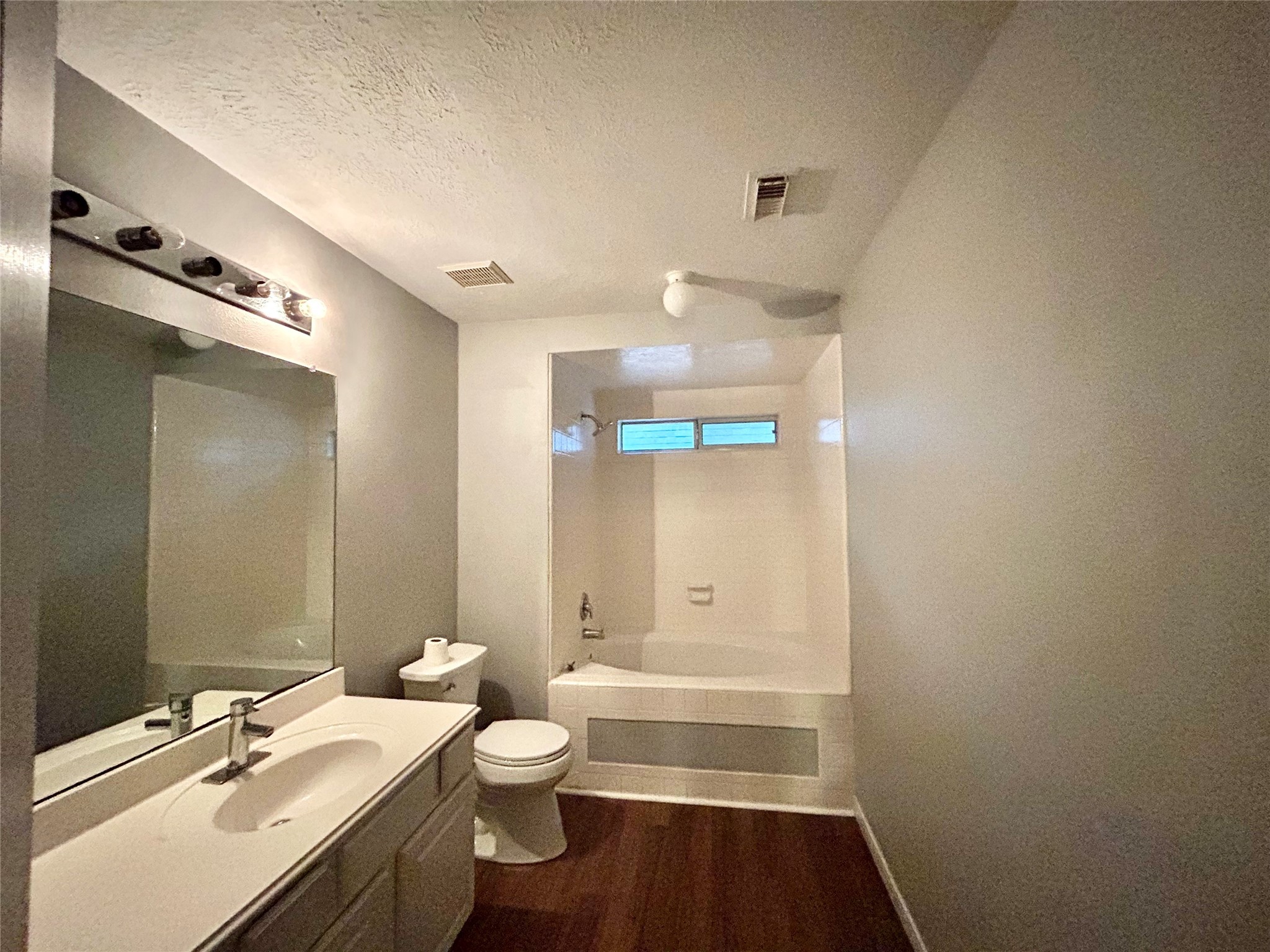 22918 Breton Point Drive Spring, TX 77373 - Photo 42 of 49 a bathroom with a sink a toilet and shower