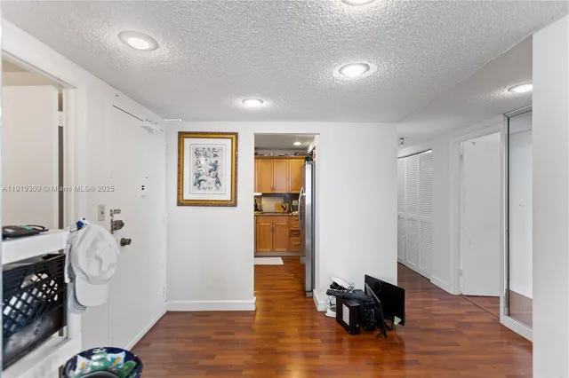 a kitchen with a refrigerator stove and microwave