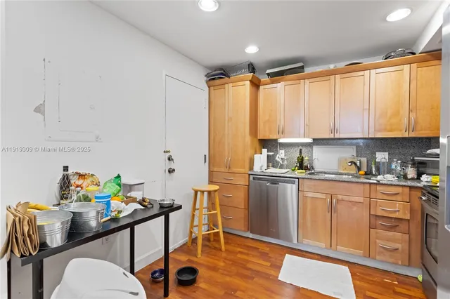 a view of a balcony with wooden floor