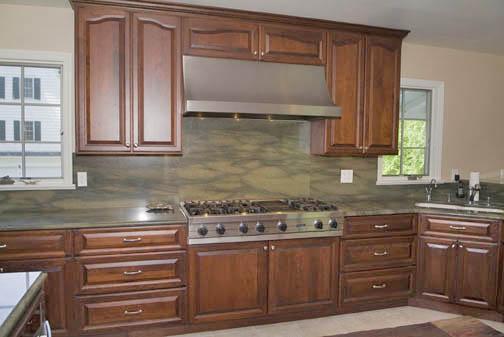 3 Intervale Place Greenwich, CT 06830 - Photo 7 of 13 a kitchen with stainless steel appliances granite countertop a sink and cabinets