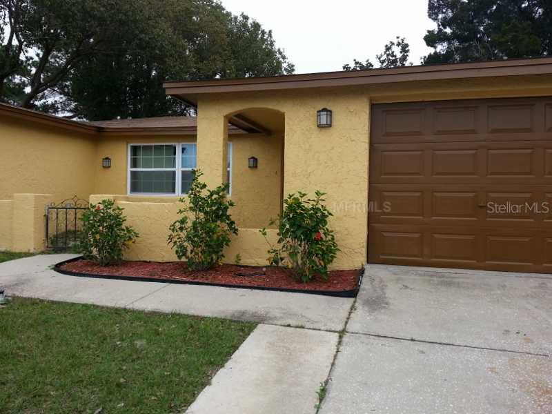 9110 Mark Twain Lane Port Richey, FL 34668 - Photo 1 of 1 Exterior Front
