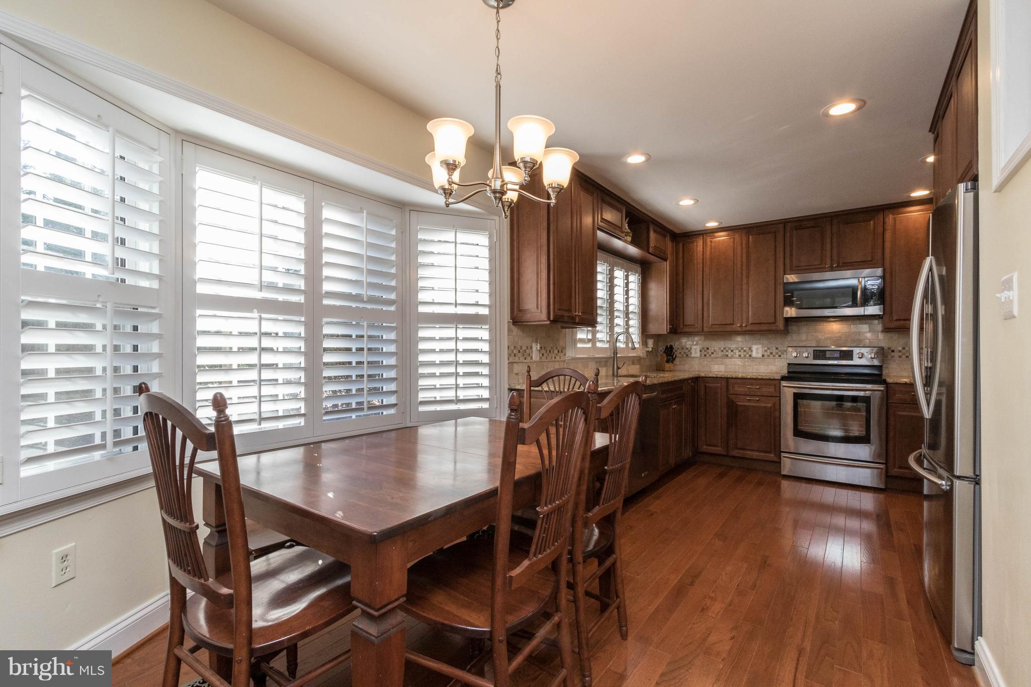 10104 Marshall Pond Road Burke, VA 22015 - Photo 10 of 30 Plantation shutters and light filled space