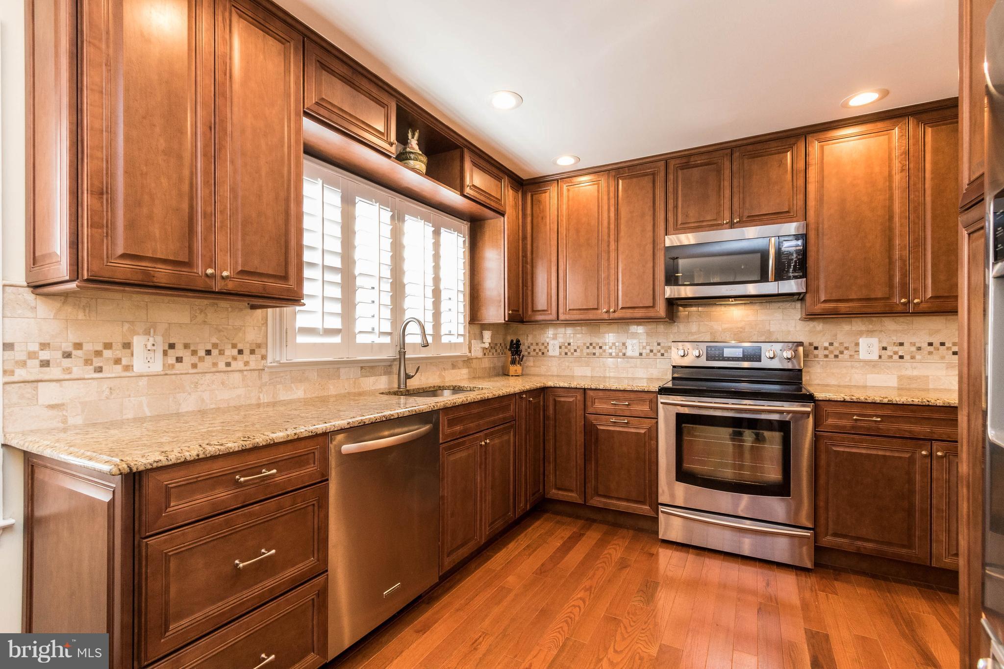 10104 Marshall Pond Road Burke, VA 22015 - Photo 13 of 30 Beautiful granite and upgraded cabinets