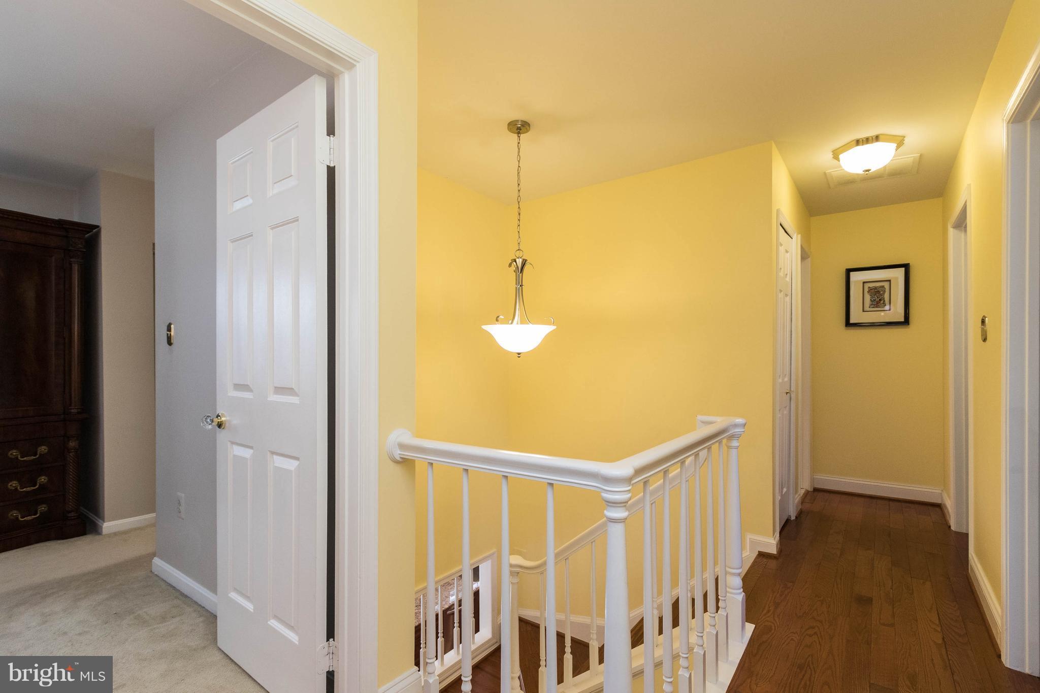 10104 Marshall Pond Road Burke, VA 22015 - Photo 15 of 30 2nd level wood flooring hallway