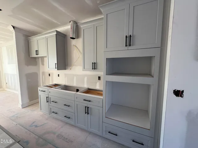 a large kitchen with lot of counter space