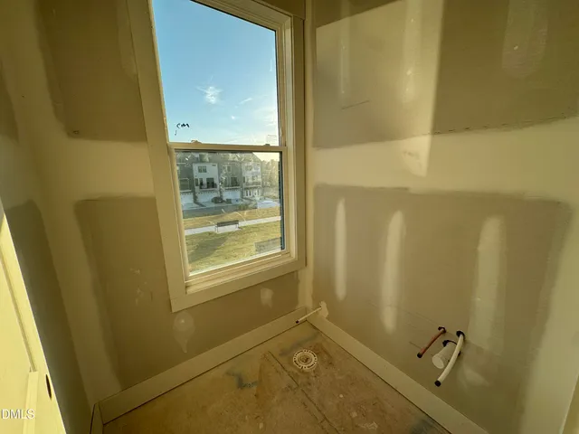 a view of a kitchen with cabinets