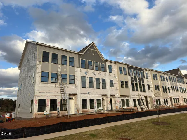 a front view of a building with balcony