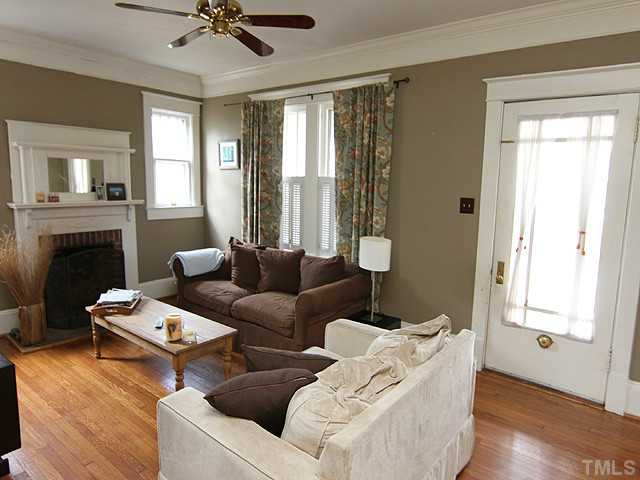 1406 Mordecai Drive Raleigh, NC 27604 - Photo 5 of 15 Living Room Offers Smooth 9' Ceilings with Crown Molding - Beautiful Glass Front Door