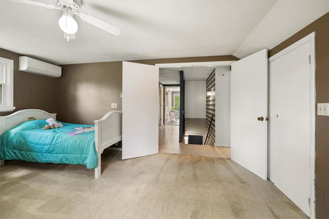 5120 Wheelock Road Troy, OH 45373 - Photo 30 of 67 This cozy bedroom features comfortable carpet flooring, offering a peaceful and inviting retreat.