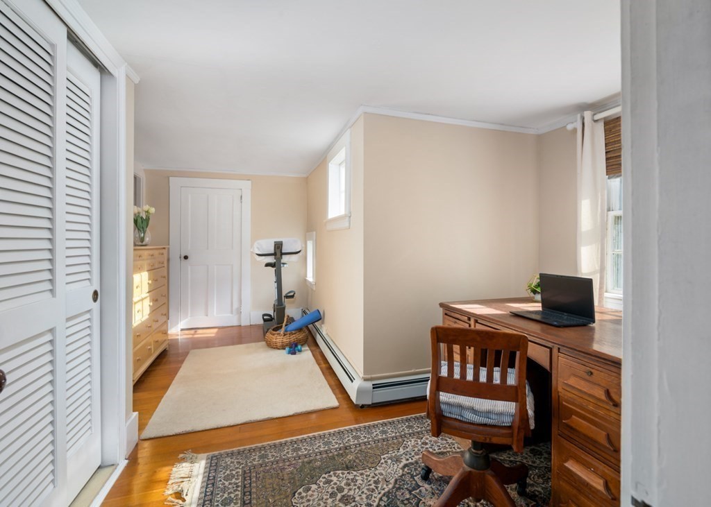 887 Broadway Hanover, MA 02339 - Photo 16 of 27 a room with furniture and a table