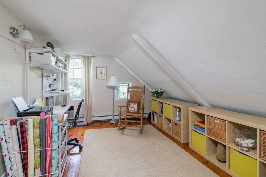 887 Broadway Hanover, MA 02339 - Photo 20 of 27 a living room with lots of furniture and a wooden floor