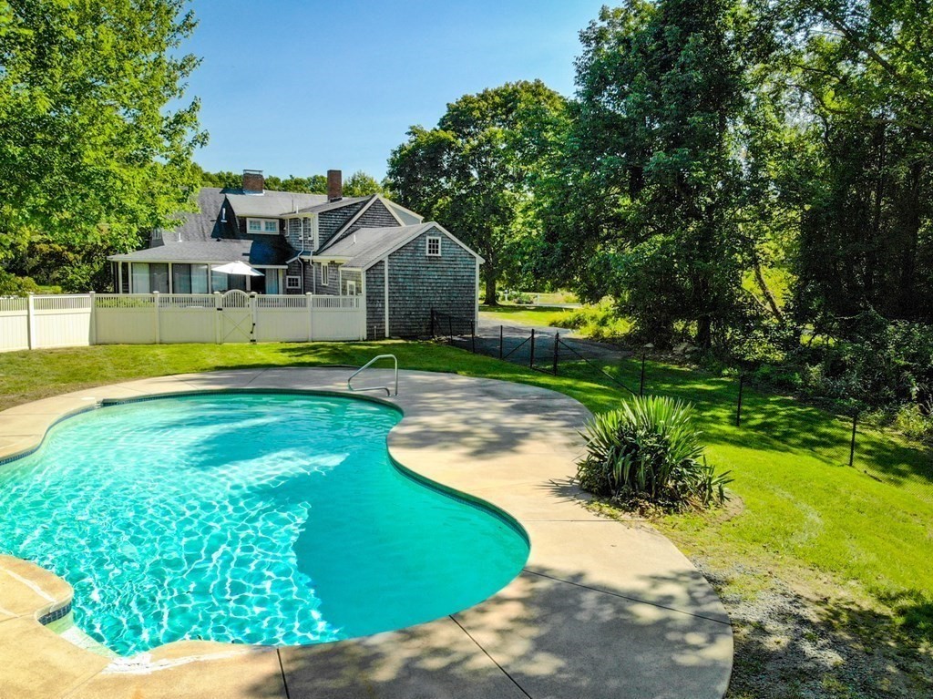 887 Broadway Hanover, MA 02339 - Photo 25 of 27 a swimming pool view with a outdoor seating