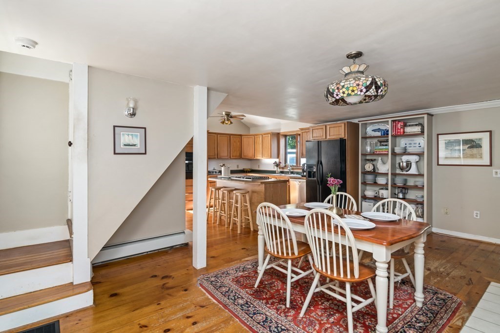 887 Broadway Hanover, MA 02339 - Photo 4 of 27 a view of a dining room with furniture