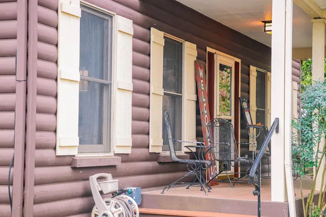 a view of car parked in front of house