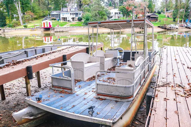 a view of swimming pool with outdoor seating