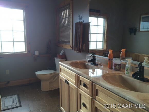 239 Howardsville Road Staunton, VA 24401 - Photo 13 of 20 a kitchen with a sink cabinets and a window