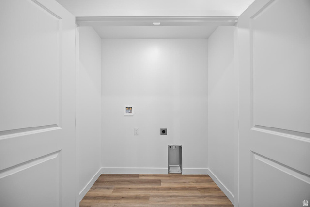 2123 Wolverine Way, Unit 2437 Washington, UT 84780 - Photo 33 of 40 Dedicated laundry space featuring wood-finish flooring and bright white walls