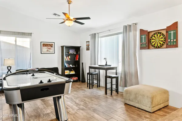 a living room with furniture and a table