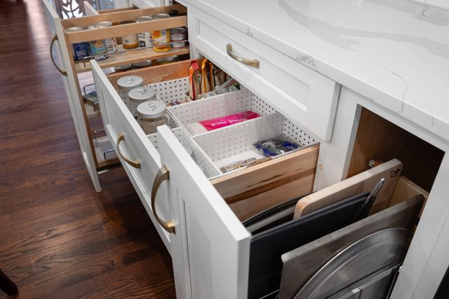 a spacious bathroom with a double vanity sink mirror and bathtub