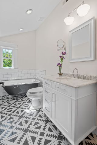 an aerial view of a house with outdoor space