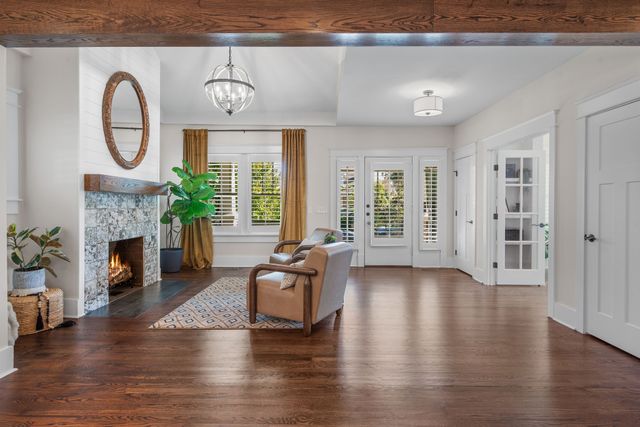 a view of a living room and dining room