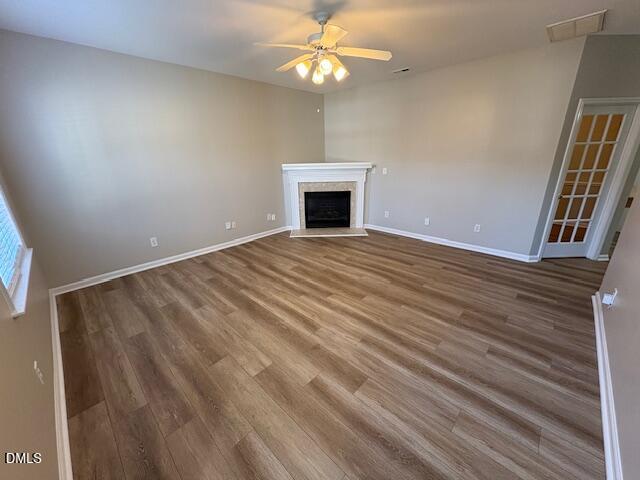 1007 Double Spring Court Apex, NC 27502 - Photo 3 of 22 a view of an empty room with a chandelier fan