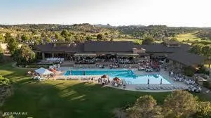 a view of a town with mountains in the background