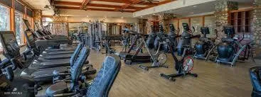 a view of walk in closet with clothes