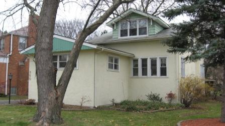 380 Blackhawk Road Riverside, IL 60546 - Photo 1 of 1 a front view of a house with garden