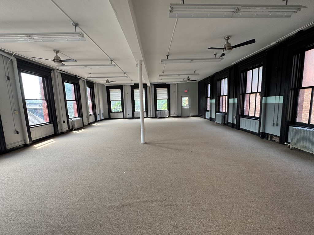 206 Seneca Street Oil City, PA 16301 - Photo 2 of 21 a big room with windows and a balcony