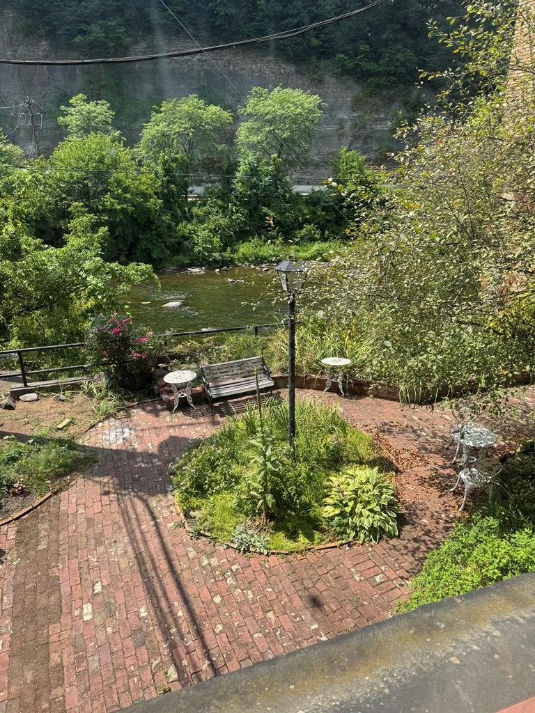 206 Seneca Street Oil City, PA 16301 - Photo 8 of 21 a view of a lake with a yard