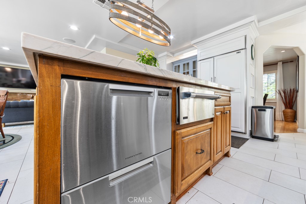 4031 Pine Avenue Long Beach, CA 90807 - Photo 30 of 70 a kitchen with stainless steel appliances granite countertop a refrigerator and a stove