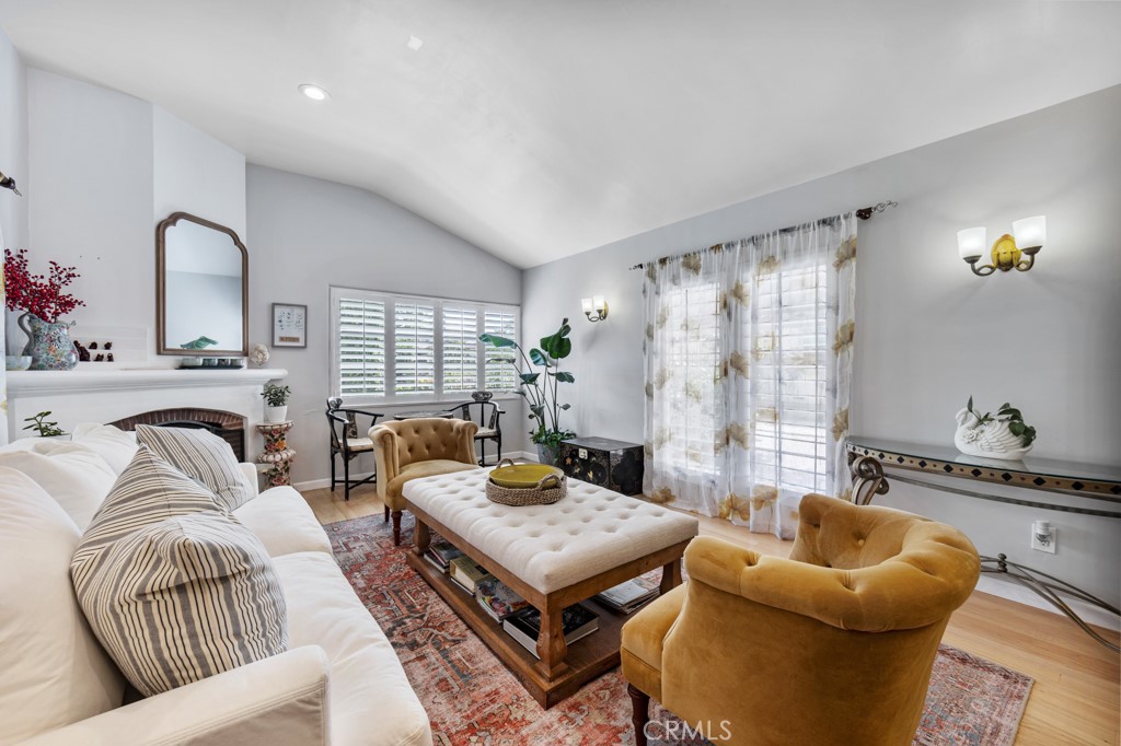 4031 Pine Avenue Long Beach, CA 90807 - Photo 4 of 70 a living room with furniture and a large window