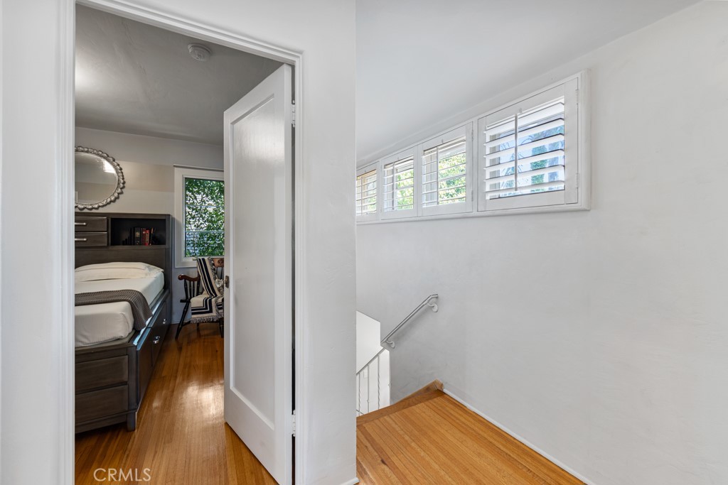 4031 Pine Avenue Long Beach, CA 90807 - Photo 49 of 70 a view of a bedroom with wooden floor