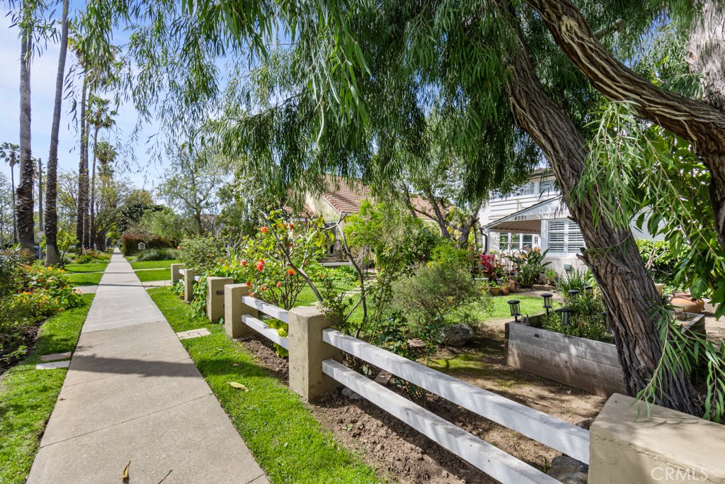 4031 Pine Avenue Long Beach, CA 90807 - Photo 56 of 70 a house with lots of trees in front of it