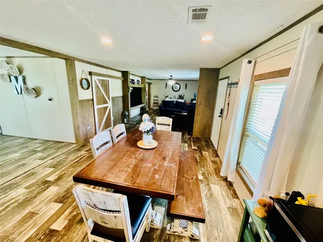 a view of a dining room with furniture